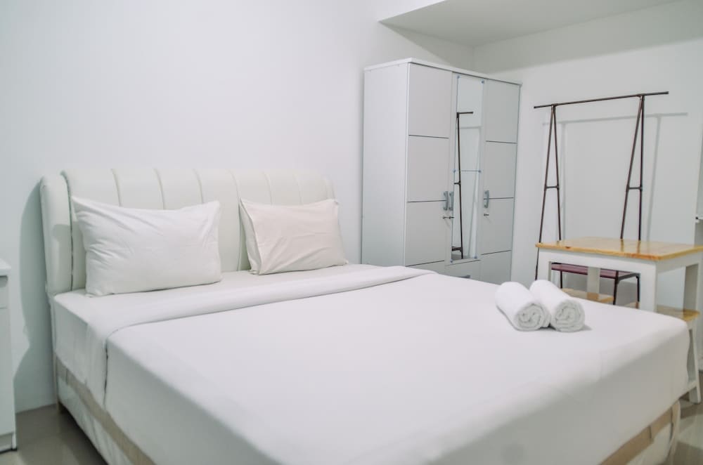 minimalist studio room at urbantown serpong apartment