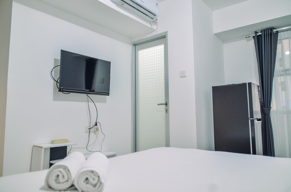 minimalist studio room at urbantown serpong apartment