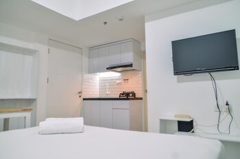 minimalist studio room at urbantown serpong apartment
