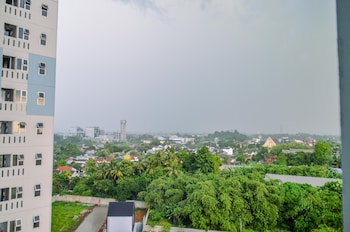 minimalist studio room at urbantown serpong apartment