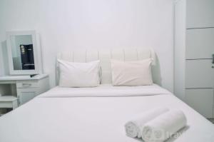 minimalist studio room at urbantown serpong apartment