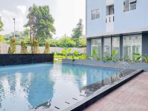 minimalist studio room at urbantown serpong apartment