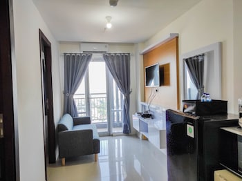 homey and comfy 2br at vida view apartment