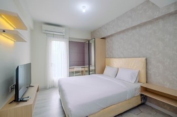 graceful studio room at podomoro golf view apartment by travelio