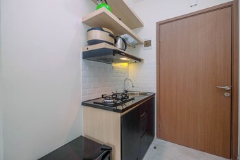 graceful studio room at podomoro golf view apartment by travelio