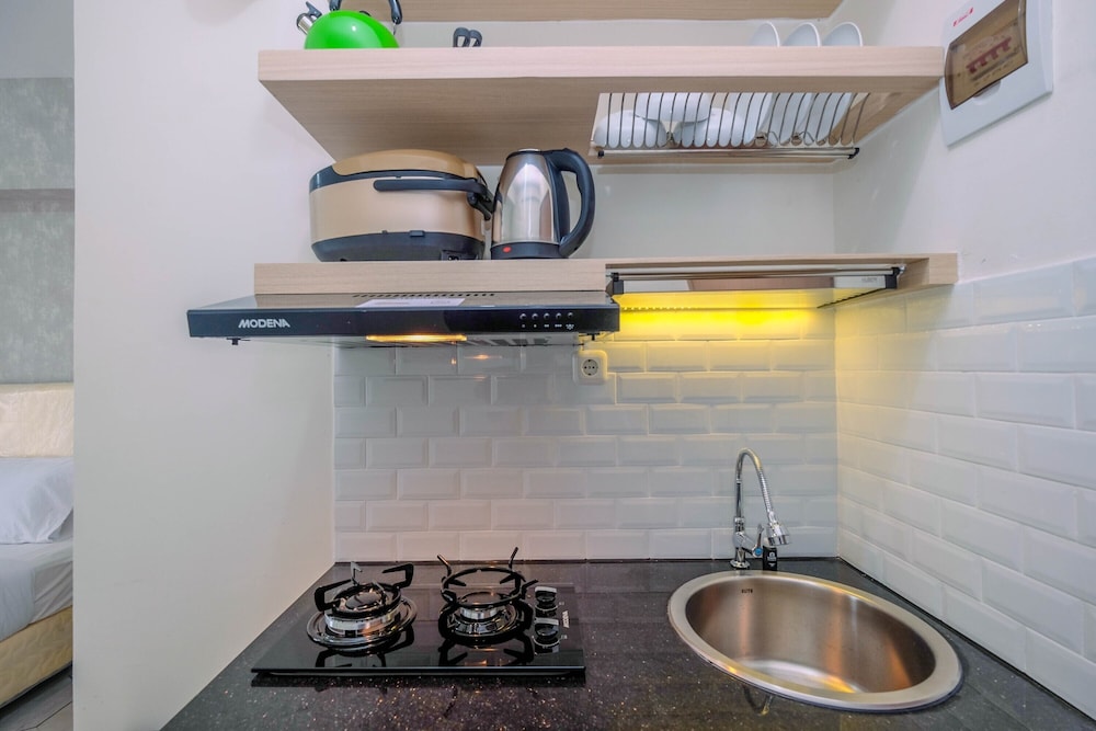 graceful studio room at podomoro golf view apartment by travelio