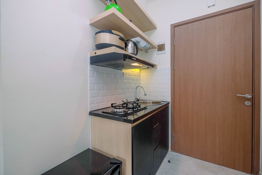 graceful studio room at podomoro golf view apartment by travelio