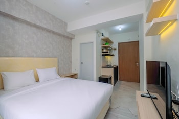 graceful studio room at podomoro golf view apartment by travelio
