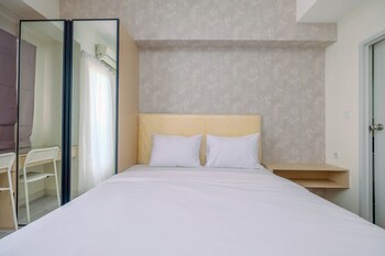 graceful studio room at podomoro golf view apartment by travelio