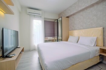 graceful studio room at podomoro golf view apartment by travelio