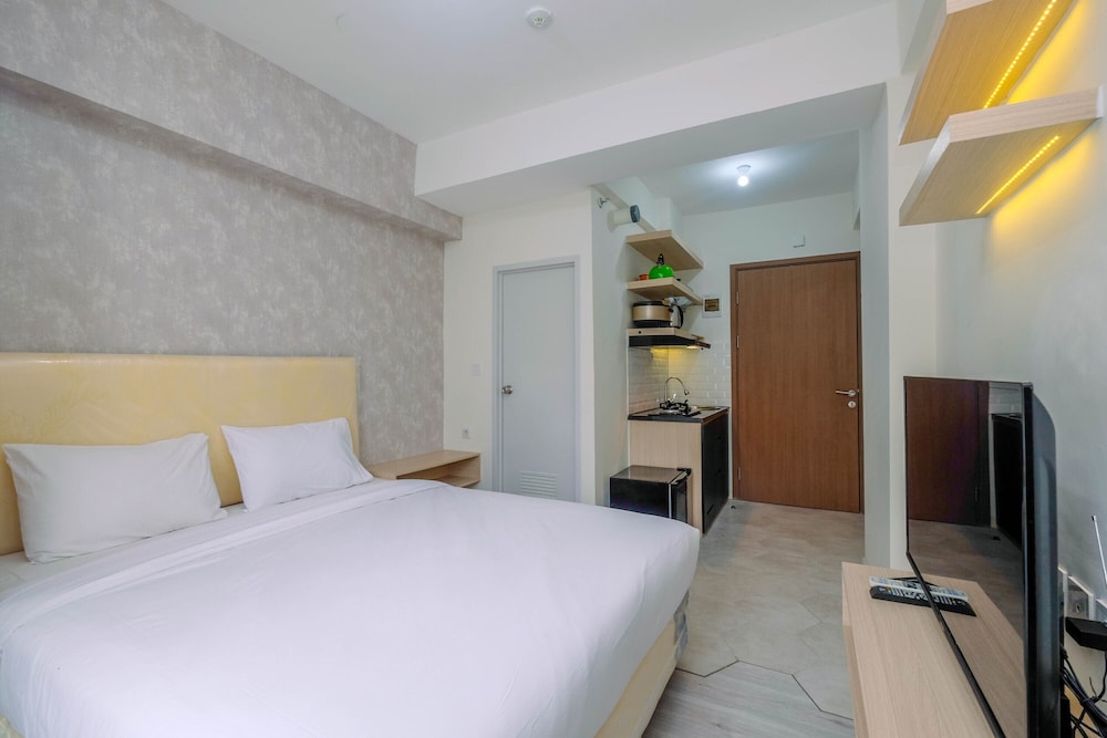 graceful studio room at podomoro golf view apartment by travelio