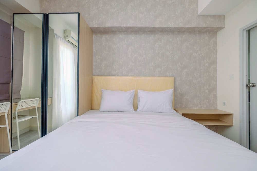 graceful studio room at podomoro golf view apartment by travelio