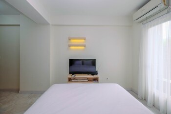 graceful studio room at podomoro golf view apartment by travelio