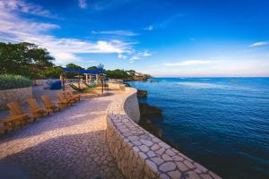 ocean cliff hotel negril limited