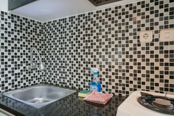 homey studio margonda residence 1 apartment