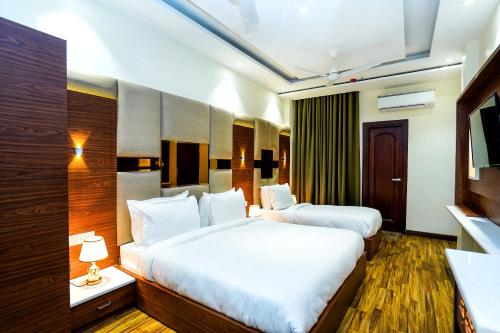 hotel aura grand by levelup hotels
