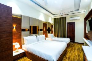 hotel aura grand by levelup hotels