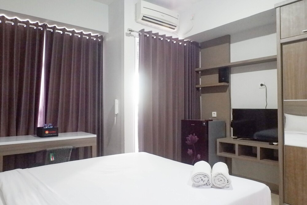 delightful luxurious studio room at taman melati surabaya apartment