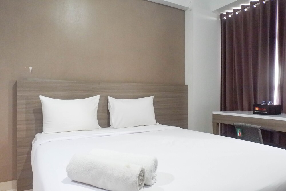delightful luxurious studio room at taman melati surabaya apartment