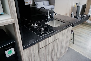 modern and homey studio at bintaro icon apartment