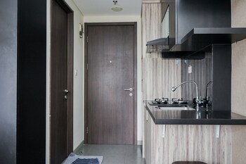 modern and homey studio at bintaro icon apartment