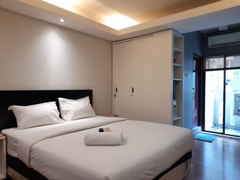 modern studio room at gateway ahmad yani cicadas apartment