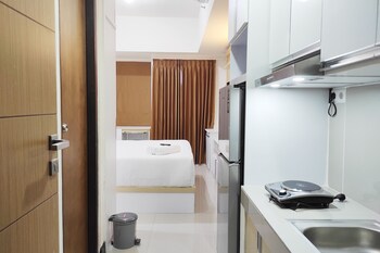 tranquil studio apartment at vida view makassar