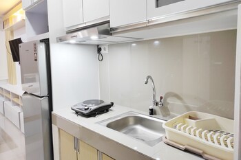 tranquil studio apartment at vida view makassar