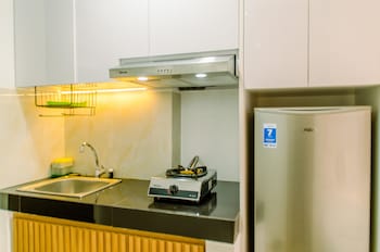 homey and cozy stay studio room at serpong garden apartmen