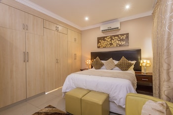 ezulwini guest house queen room with balcony pool view jacuzzi