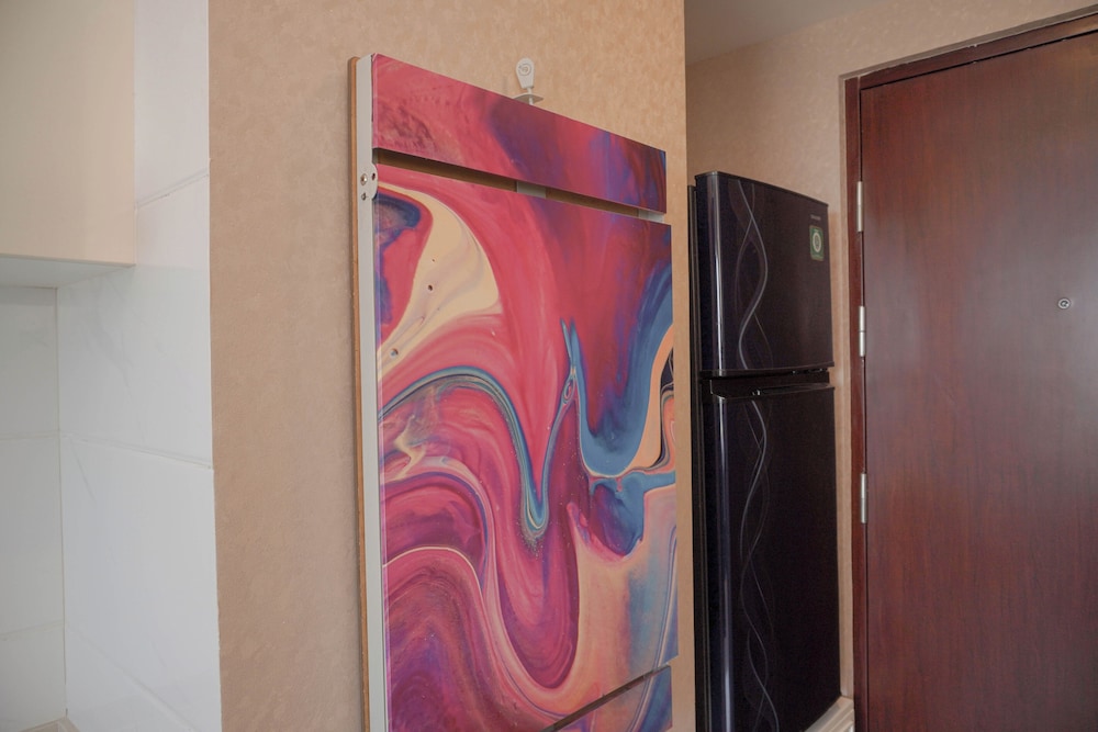 comfort and strategic studio apartment at sky house bsd