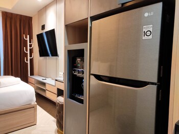 comfy studio at vida view makassar apartment