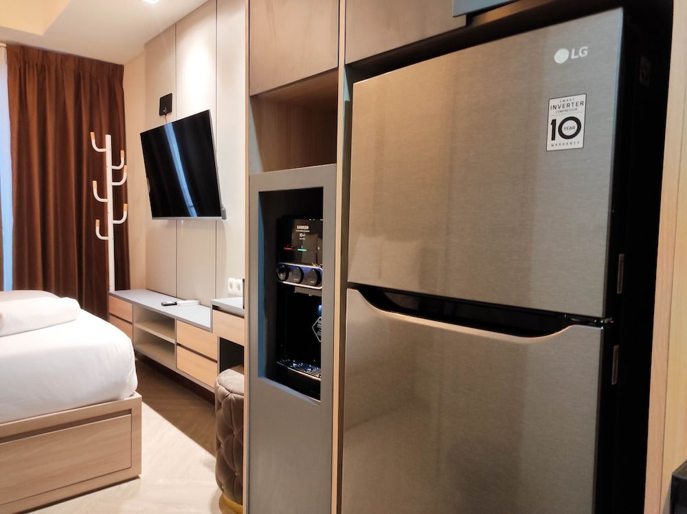 comfy studio at vida view makassar apartment