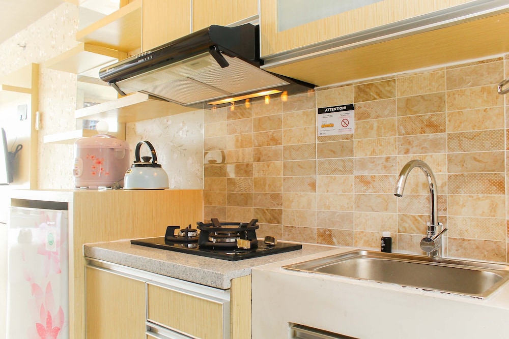 tidy and homey studio apartment at mustika golf residence