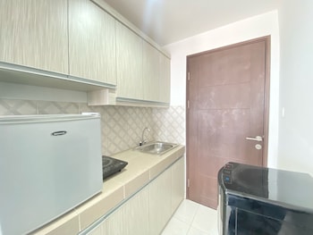 spacious studio room at mekarwangi square cibaduyut apartment