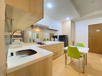 spacious studio room at gateway ahmad yani cicadas apartment