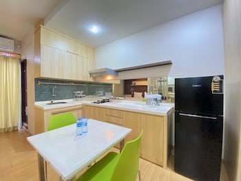 spacious studio room at gateway ahmad yani cicadas apartment