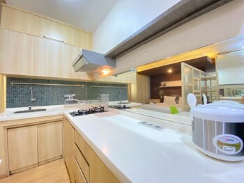 spacious studio room at gateway ahmad yani cicadas apartment