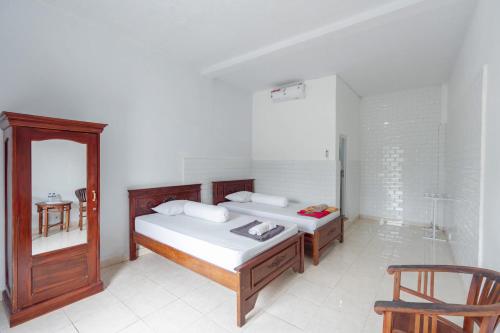 sdk homestay uluwatu redpartner