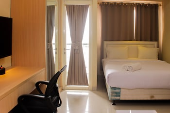 comfort studio room at oasis cikarang apartment