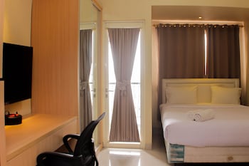 comfort studio room at oasis cikarang apartment