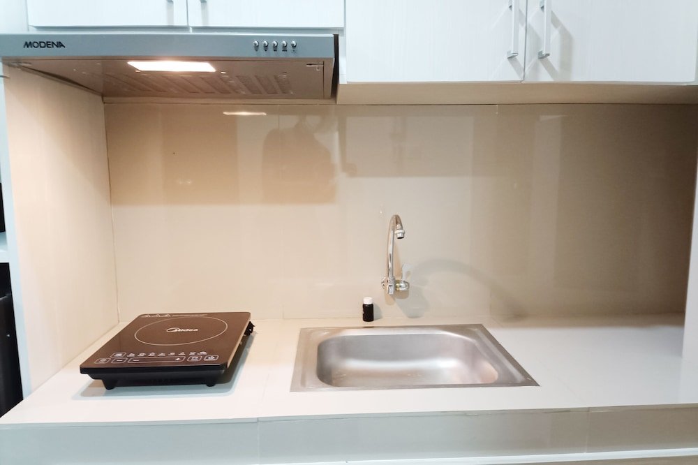 homey and tidy studio apartment at vida view makassar