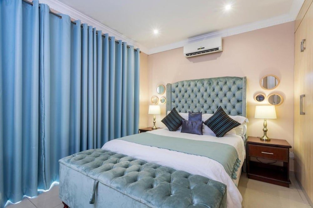 ezulwini guest house standard double room with balcony pool view