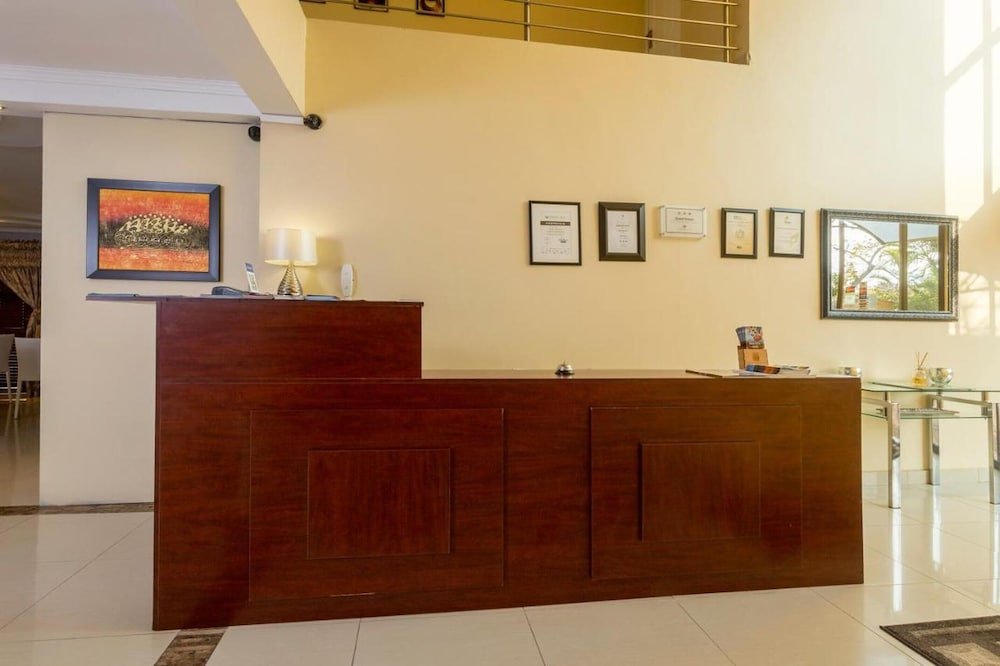 ezulwini guest house standard double room with balcony pool view