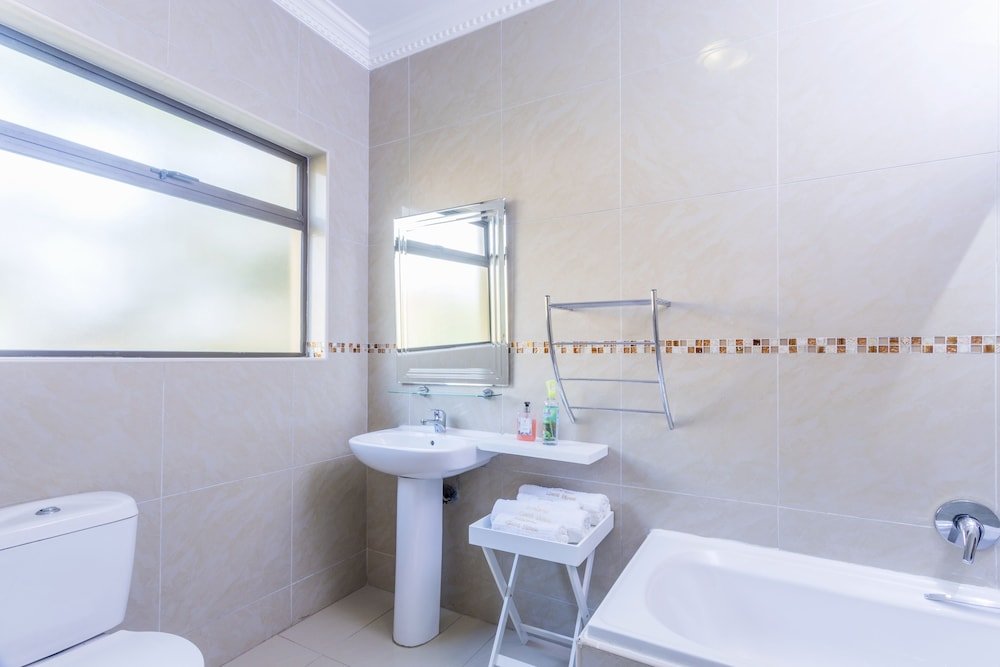 ezulwini guest house standard double room with balcony pool view