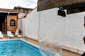 casa com piscina e churrasqueira em caraguatatuba