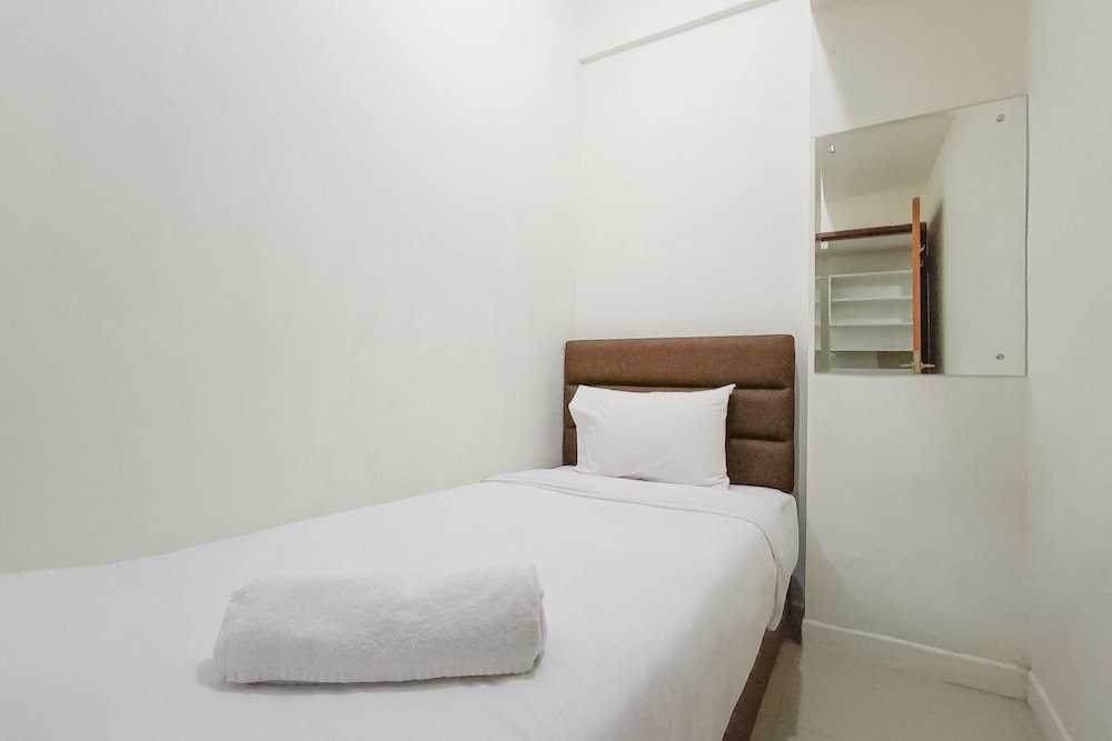 nice and homey 2br at vida view makasar apartment