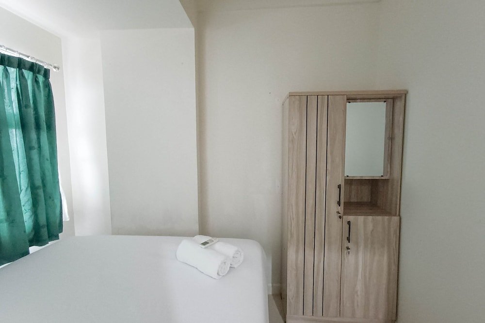 nice and homey 2br at vida view makasar apartment