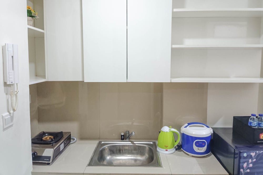 nice and homey 2br at vida view makasar apartment