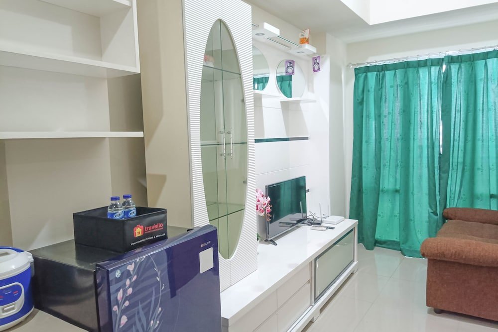 nice and homey 2br at vida view makasar apartment